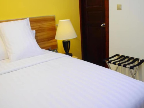 Imagen de la habitación del Hotel The Grand View. Foto 13