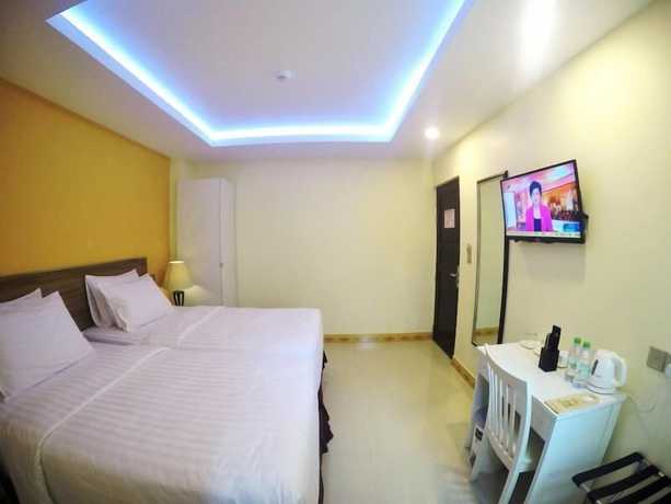 Imagen de la habitación del Hotel The Grand View. Foto 15