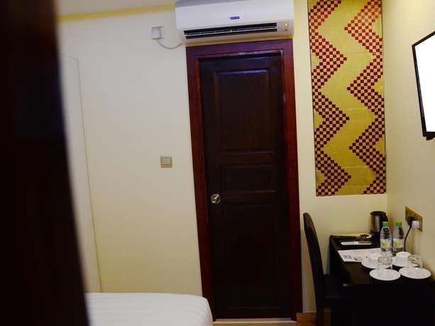 Imagen de la habitación del Hotel The Grand View. Foto 16