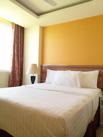 Imagen de la habitación del Hotel The Grand View. Foto 18