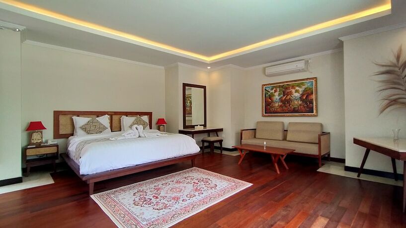 Imagen de la habitación del Hotel The Grand Villandra Resort. Foto 11