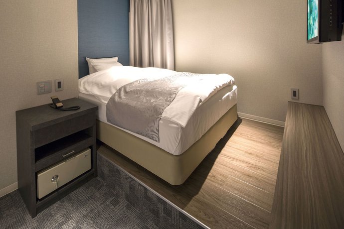 Imagen de la habitación del Hotel The Grandee Shinsaibashi. Foto 10