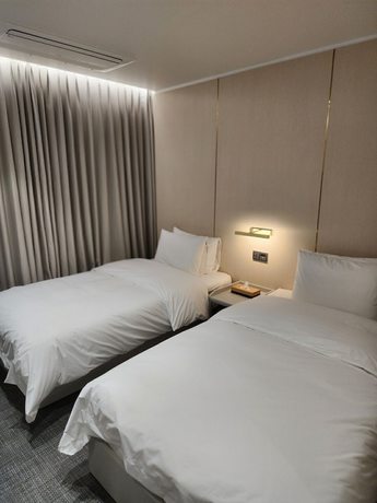 Imagen de la habitación del Hotel The Grang Seogwipo. Foto 12