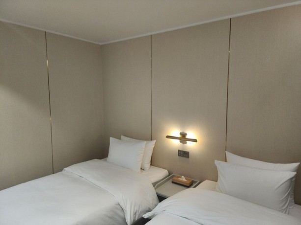 Imagen de la habitación del Hotel The Grang Seogwipo. Foto 13