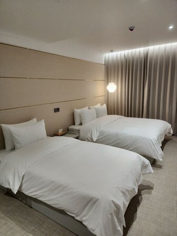 Imagen de la habitación del Hotel The Grang Seogwipo. Foto 15