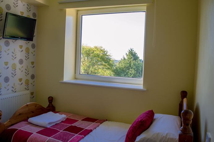 Imagen de la habitación del Hotel The Grange Boutique Guest House. Foto 8