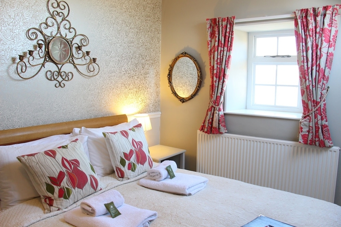 Imagen de la habitación del Hotel The Grange Country House. Foto 11