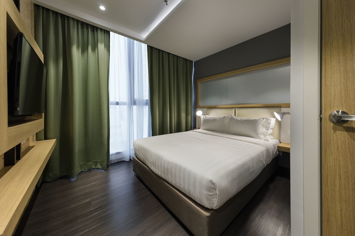 Imagen de la habitación del Hotel The Granite Luxury Penang. Foto 4
