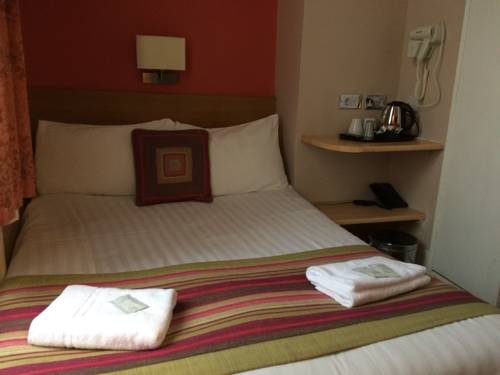 Imagen de la habitación del Hotel The Grapevine. Foto 5