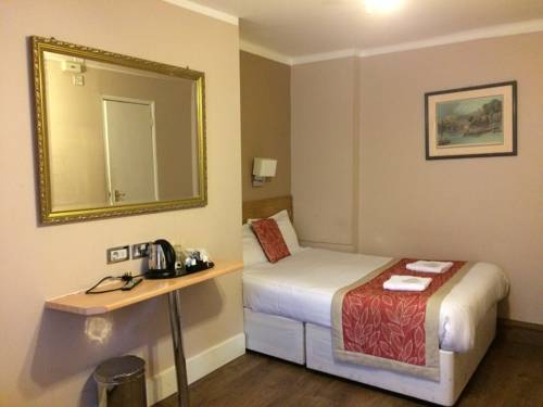 Imagen de la habitación del Hotel The Grapevine, Londres. Foto 10