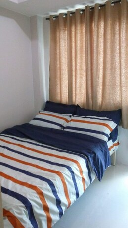 Imagen de la habitación del Hotel The Grass Residences. Foto 6