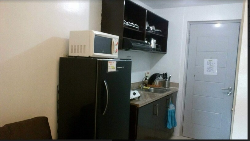 Imagen de la habitación del Hotel The Grass Residences. Foto 8