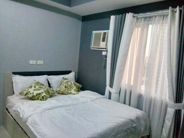 Imagen de la habitación del Hotel The Grass Residences. Foto 9