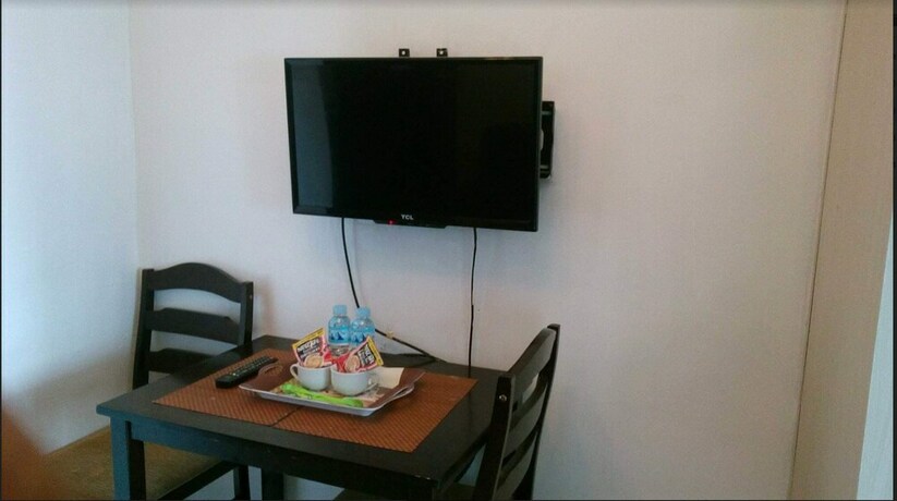Imagen de la habitación del Hotel The Grass Residences. Foto 15