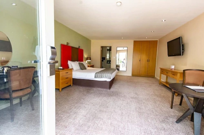 Imagen de la habitación del Hotel The Great Hallingbury Manor. Foto 18