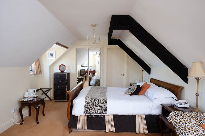 Imagen de la habitación del Hotel The Great House and Restaurant. Foto 2