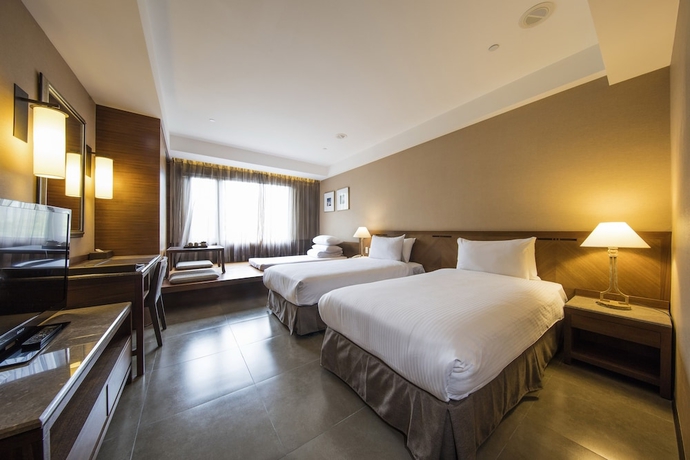 Imagen de la habitación del Hotel The Great Roots Forestry Spa Resort. Foto 8