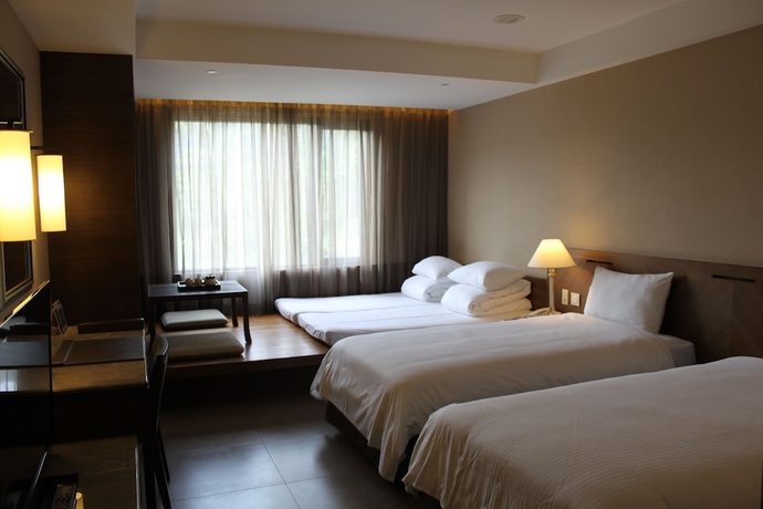 Imagen de la habitación del Hotel The Great Roots Forestry Spa Resort. Foto 13
