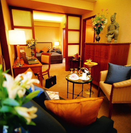 Imagen de la habitación del Hotel The Great Wall Beijing. Foto 10