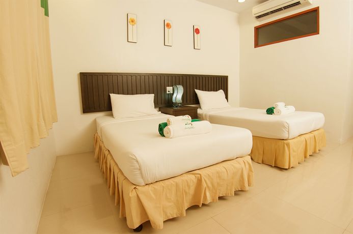 Imagen de la habitación del Hotel The Green Beach Resort. Foto 4