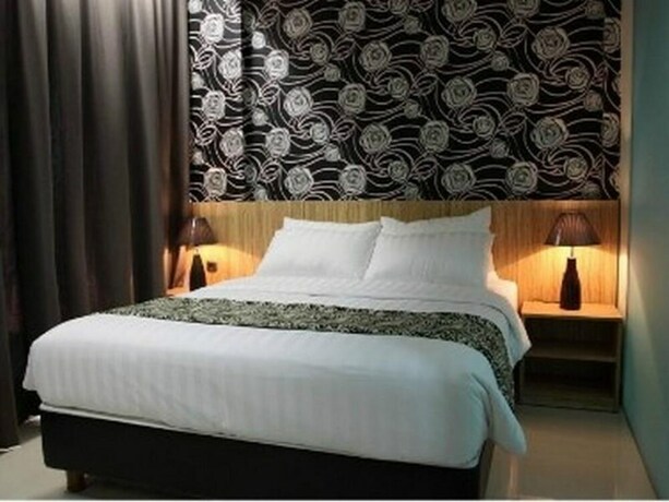 Imagen de la habitación del Hotel The Green, Bekasi. Foto 11