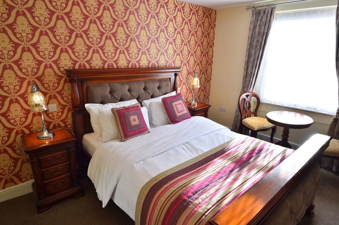 Imagen de la habitación del Hotel The Green Dragon. Foto 11