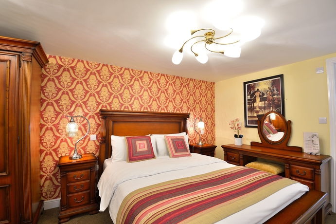 Imagen de la habitación del Hotel The Green Dragon. Foto 15