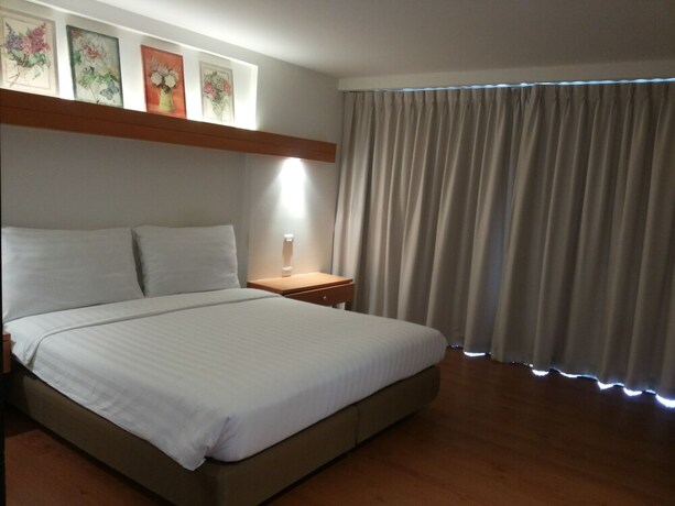 Imagen de la habitación del Hotel The Green Golf Residence Condominium. Foto 24