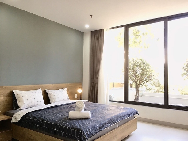 Imagen de la habitación del Hotel The Green House Binh Duong. Foto 2