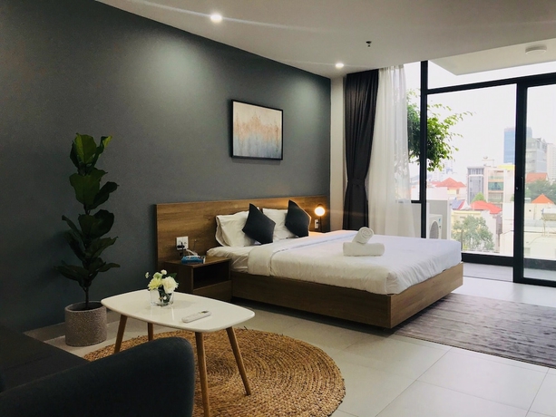 Imagen de la habitación del Hotel The Green House Binh Duong. Foto 4