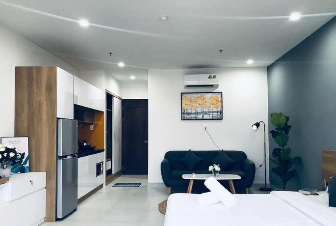 Imagen de la habitación del Hotel The Green House Binh Duong. Foto 5