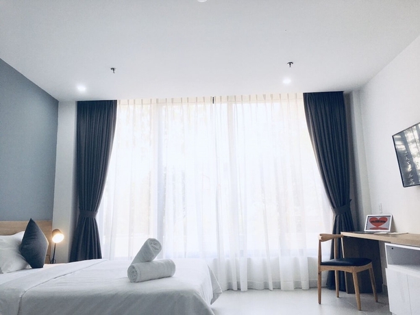 Imagen de la habitación del Hotel The Green House Binh Duong. Foto 9