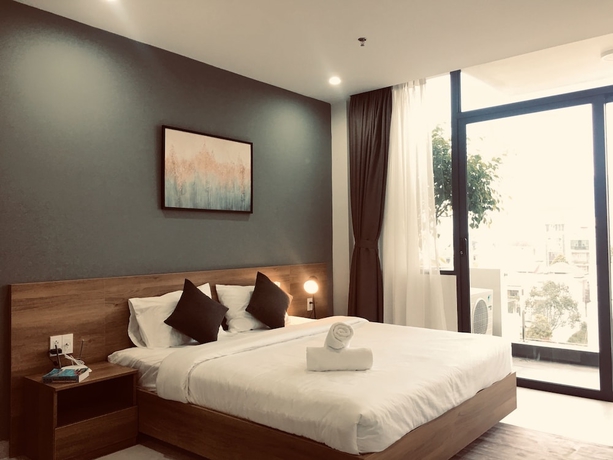 Imagen de la habitación del Hotel The Green House Binh Duong. Foto 13
