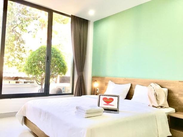 Imagen de la habitación del Hotel The Green House Binh Duong. Foto 14