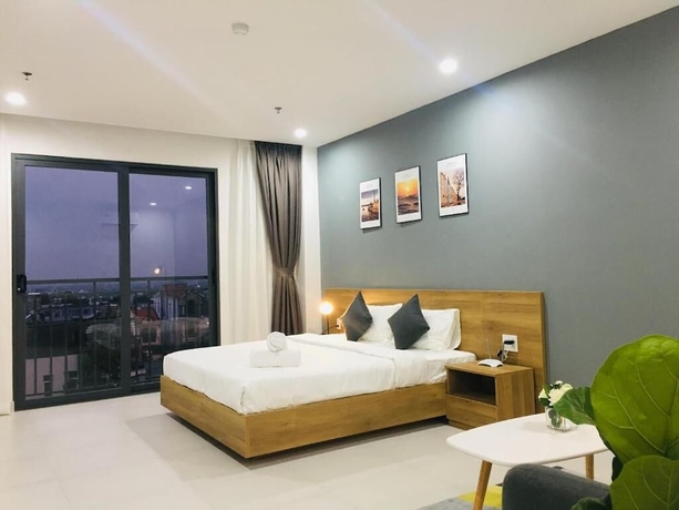Imagen de la habitación del Hotel The Green House Binh Duong. Foto 15