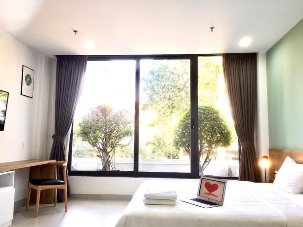 Imagen de la habitación del Hotel The Green House Binh Duong. Foto 16