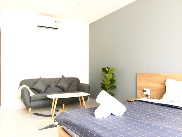 Imagen de la habitación del Hotel The Green House Binh Duong. Foto 17