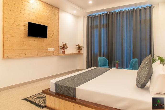 Imagen de la habitación del Hotel The Green Land Kasauli. Foto 9