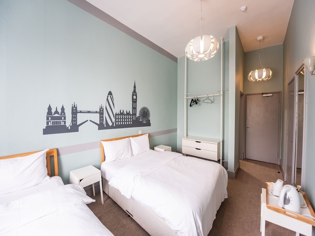 Imagen de la habitación del Hotel The Green Man. Foto 13