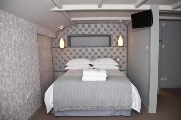 Imagen de la habitación del Hotel The Green Man. Foto 13
