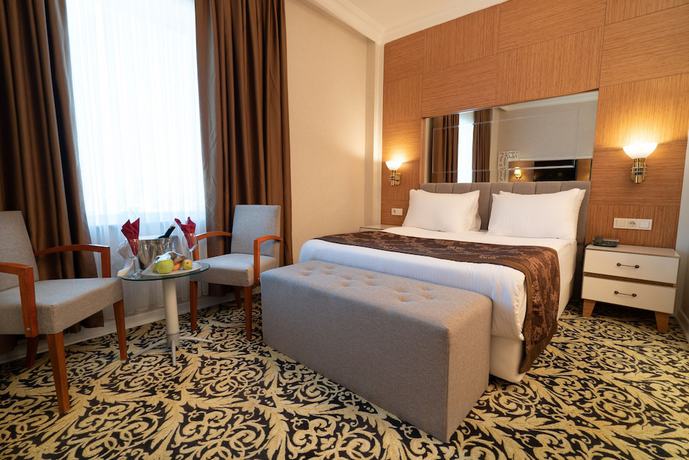 Imagen de la habitación del Hotel The Green Park Diyarbakir. Foto 13