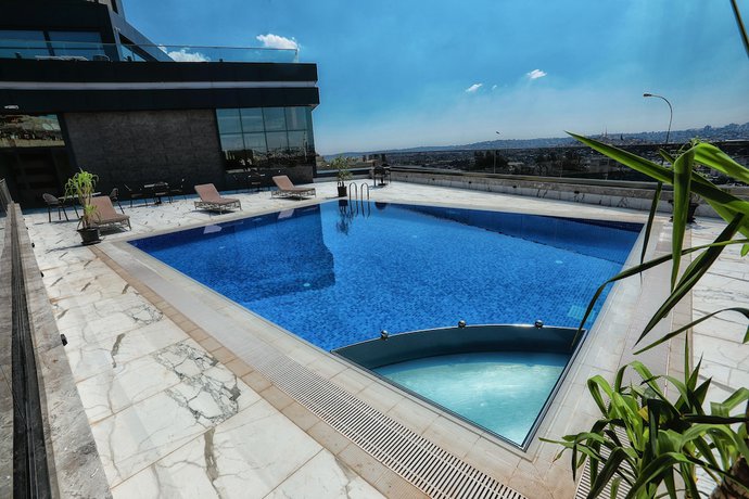 Imagen de la piscina del Hotel The Green Park Gaziantep. Foto 18