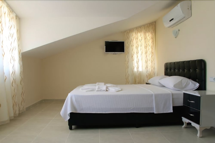 Imagen de la habitación del Hotel The Green Valley. Foto 10