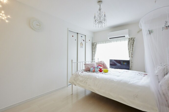 Imagen de la habitación del Hotel The Green Wonderland Shinjuku. Foto 18