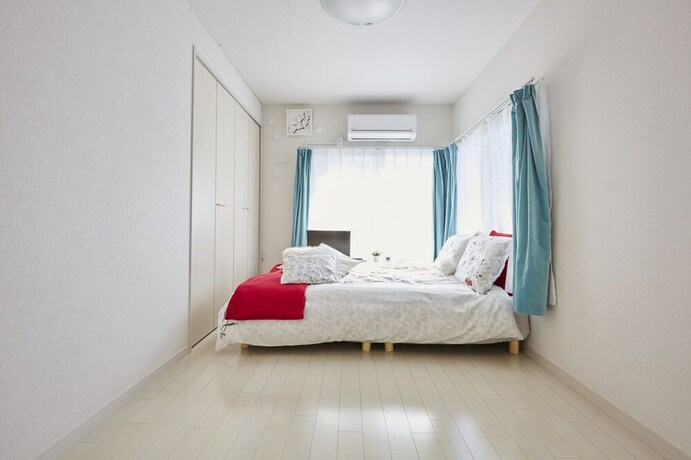 Imagen de la habitación del Hotel The Green Wonderland Shinjuku. Foto 26