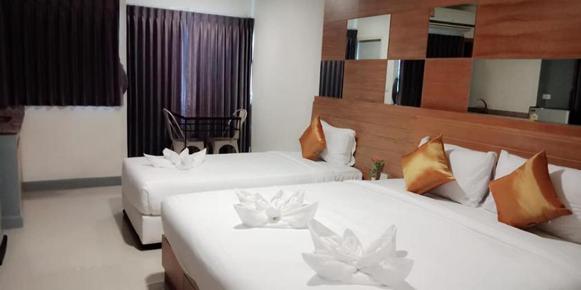 Imagen de la habitación del Hotel The Greenery Central Suites. Foto 5