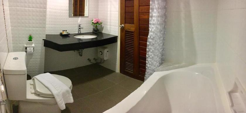 Imagen de la habitación del Hotel The Greenery Central Suites. Foto 8