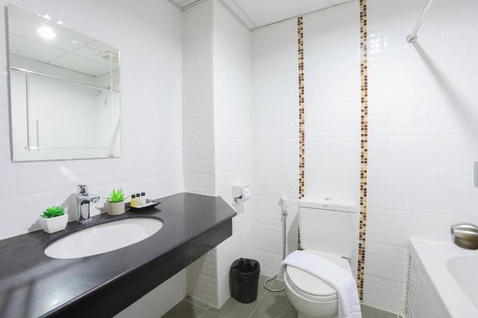 Imagen de la habitación del Hotel The Greenery Central Suites. Foto 10