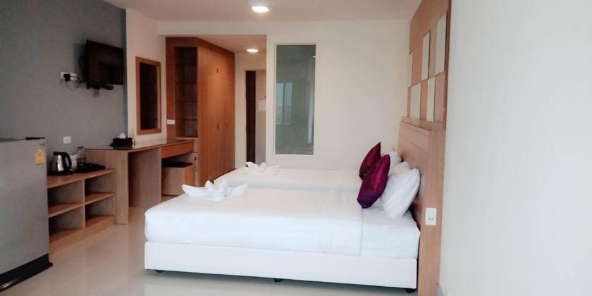 Imagen de la habitación del Hotel The Greenery Central Suites. Foto 11