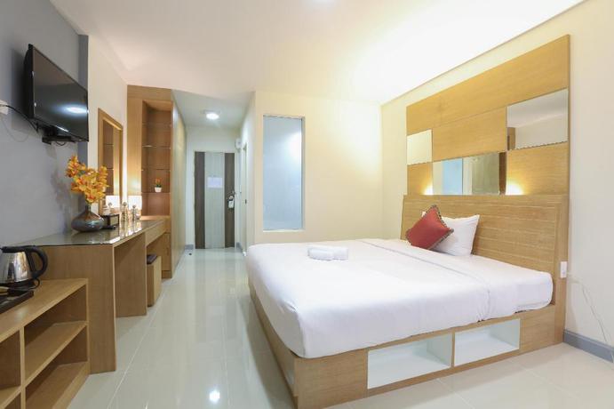 Imagen de la habitación del Hotel The Greenery Central Suites. Foto 14